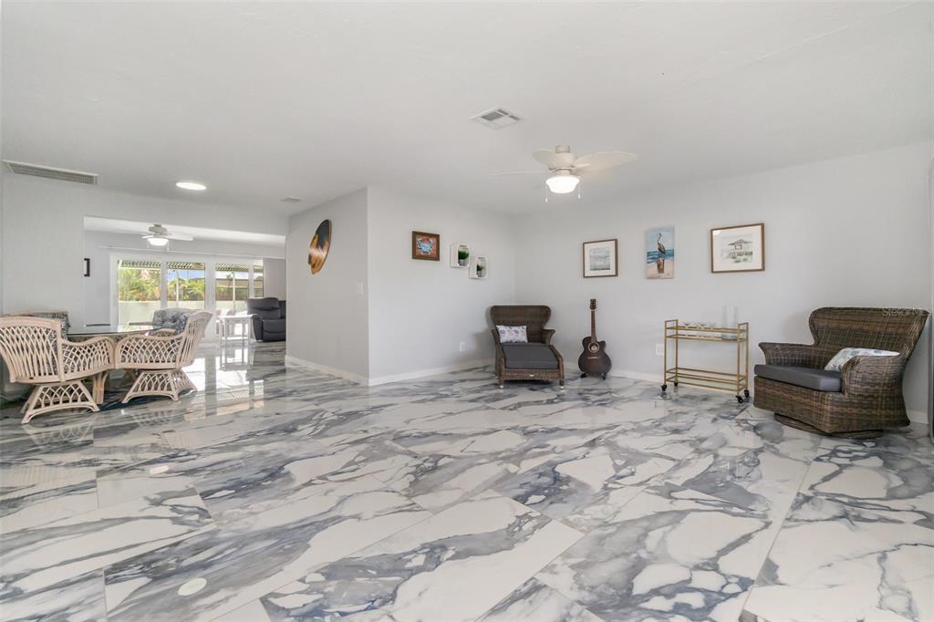 1661 Swan Terrace North Fort Myers, FL 33903 - Photo 9 of 43 a living room with furniture