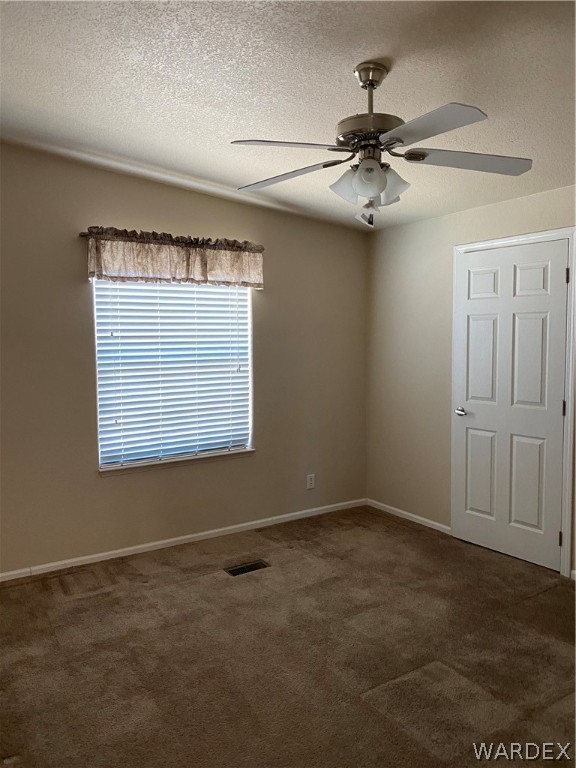 1725 Gleeson Road Golden Valley, AZ 86413 - Photo 17 of 39 a view of an empty room with a window