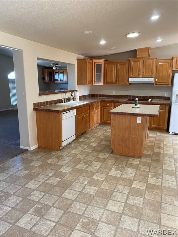 1725 Gleeson Road Golden Valley, AZ 86413 - Photo 8 of 39 a kitchen with stainless steel appliances granite countertop a stove top oven a sink a counter top space and cabinets
