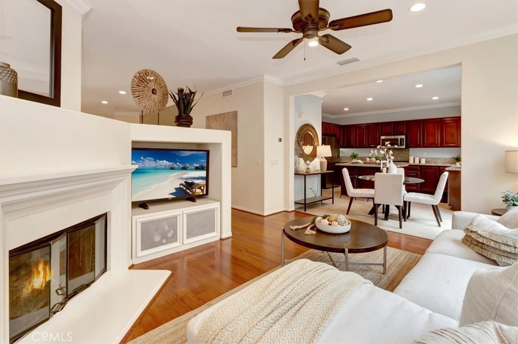 958 Baxter Parkway Brea, CA 92821 - Photo 11 of 50 a living room with furniture kitchen view and a fireplace