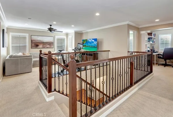 a view of interior of house with wooden floor and windows