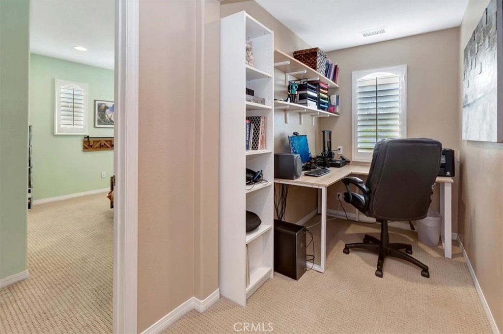 958 Baxter Parkway Brea, CA 92821 - Photo 20 of 50 a view of a workspace with furniture and a window
