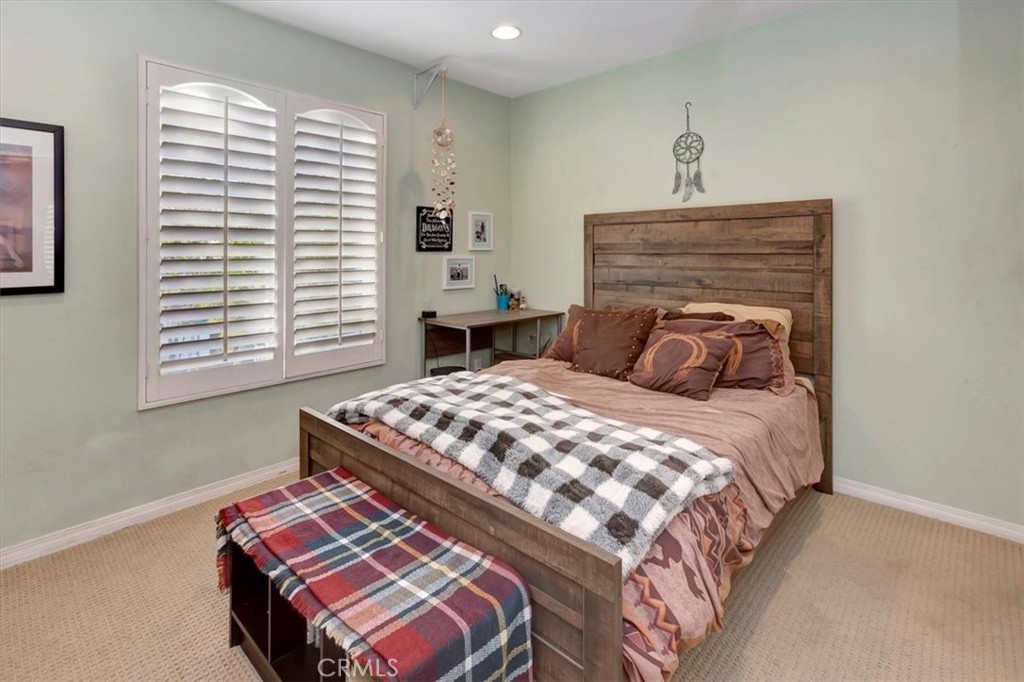 958 Baxter Parkway Brea, CA 92821 - Photo 26 of 50 a bedroom with a bed and a window