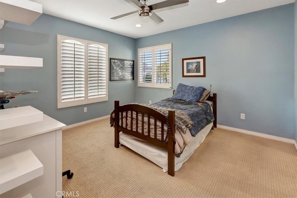 958 Baxter Parkway Brea, CA 92821 - Photo 29 of 50 a bed sitting in a bedroom next to a window