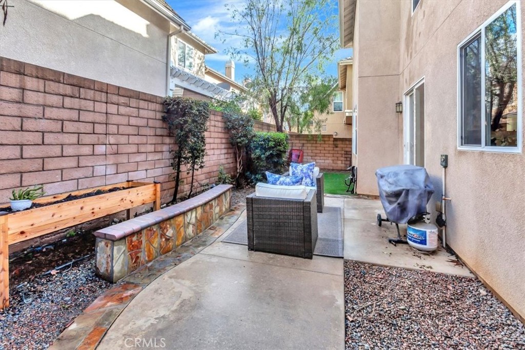 958 Baxter Parkway Brea, CA 92821 - Photo 34 of 50 a view of a chair and tables in the terrace
