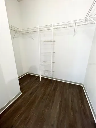 a view of an empty walk in closet