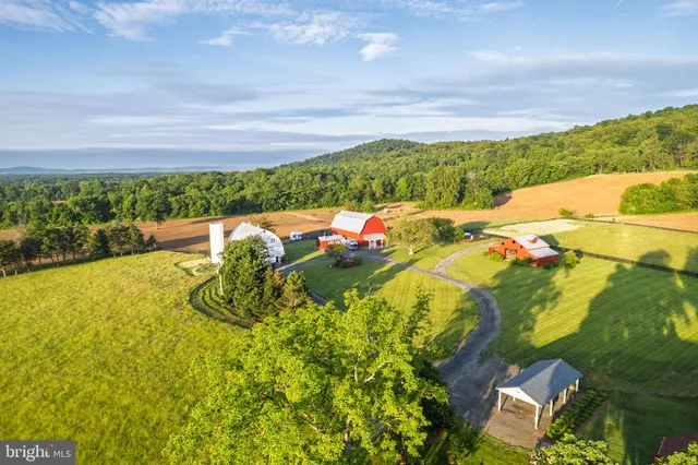 a view of a house with a big yard
