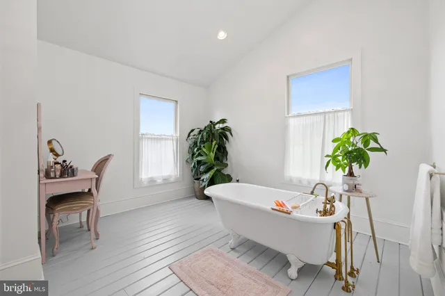 a view of a patio with a yard