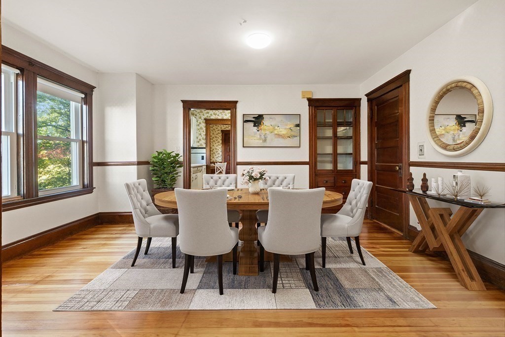 3 Station Road Salem, MA 01970 - Photo 11 of 40 a view of a dining room with furniture window and wooden floor