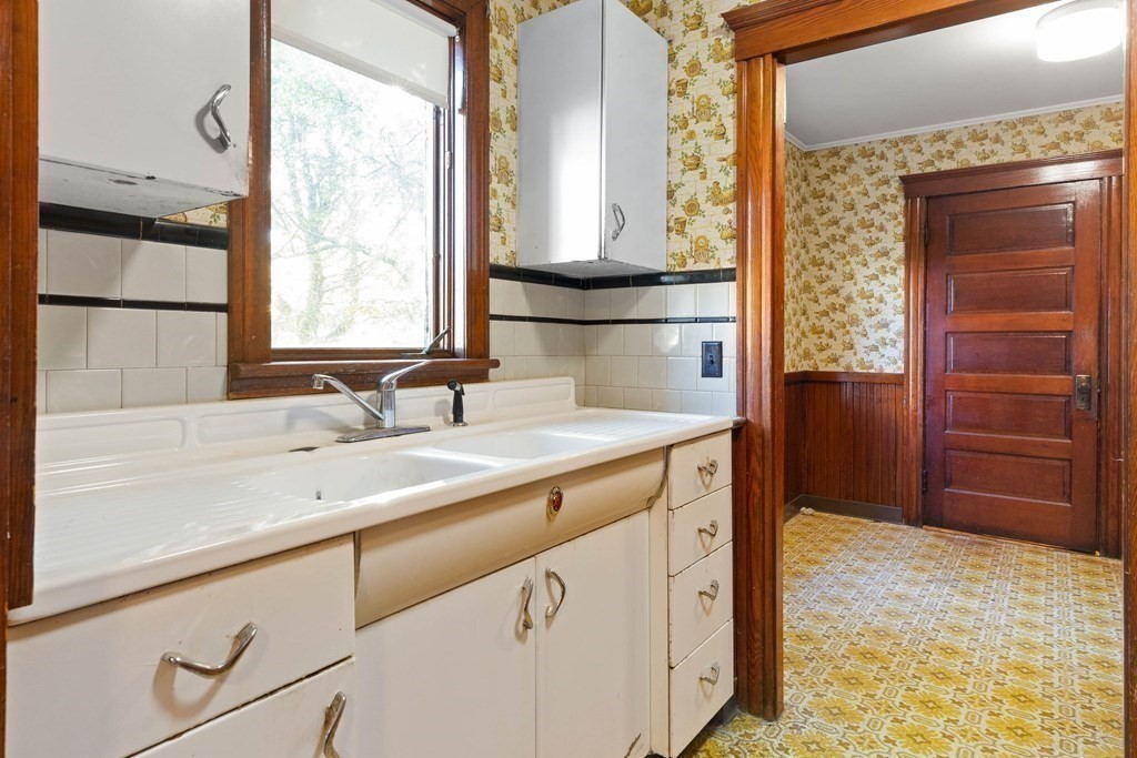 3 Station Road Salem, MA 01970 - Photo 19 of 40 a bathroom with a sink and a mirror