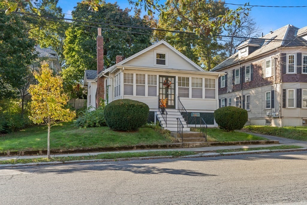 3 Station Road Salem, MA 01970 - Photo 2 of 40 a front view of a house with a yard