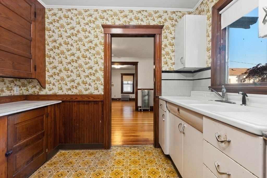 3 Station Road Salem, MA 01970 - Photo 21 of 40 a bathroom with a sink and a mirror