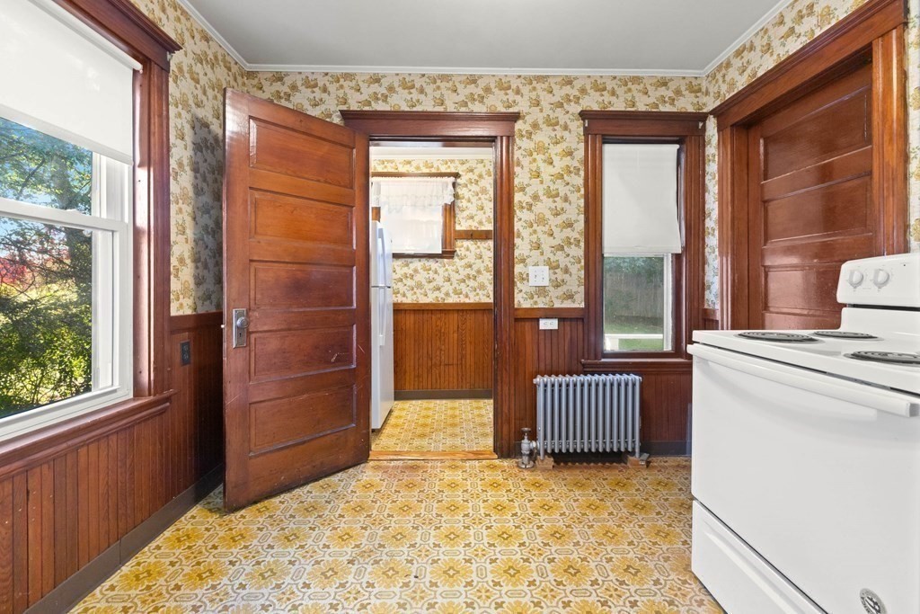 3 Station Road Salem, MA 01970 - Photo 24 of 40 a living room with furniture and a gate