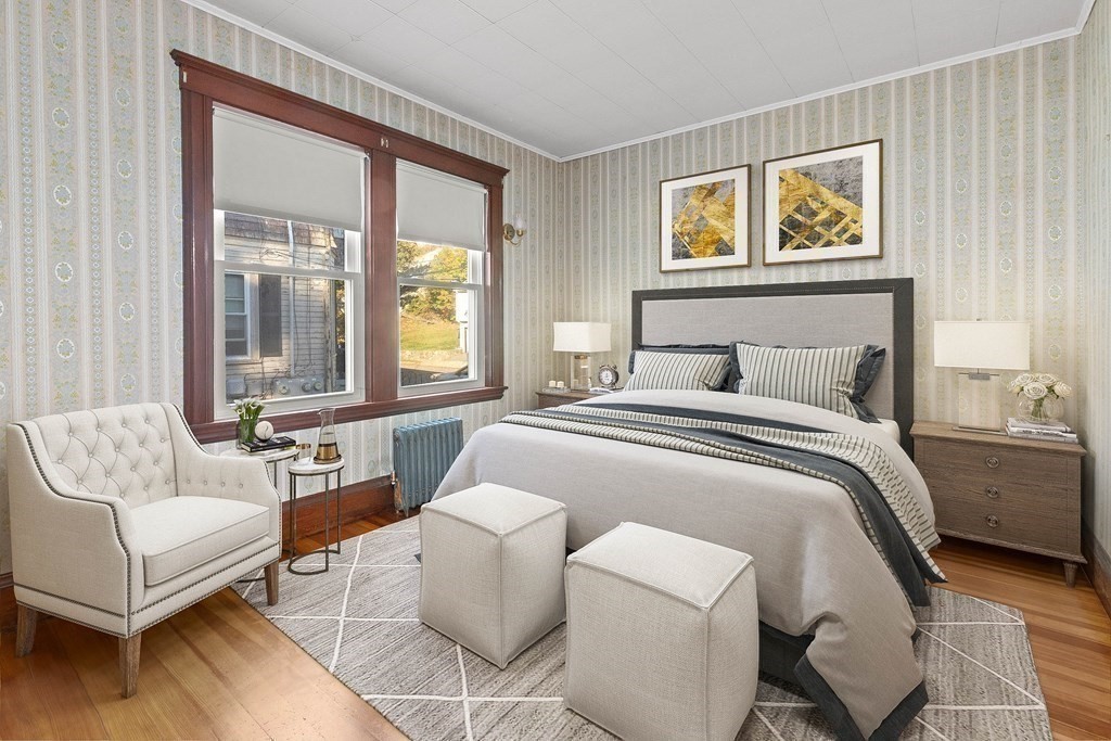 3 Station Road Salem, MA 01970 - Photo 27 of 40 a bedroom with a bed and a couch