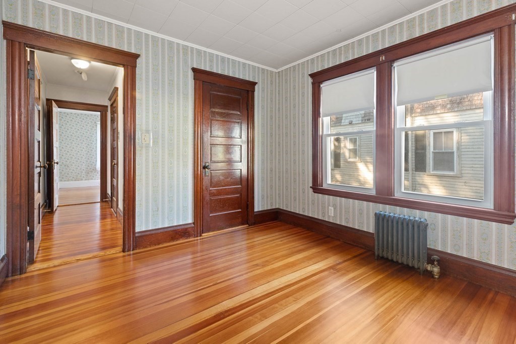 3 Station Road Salem, MA 01970 - Photo 28 of 40 wooden floor in an empty room with a window
