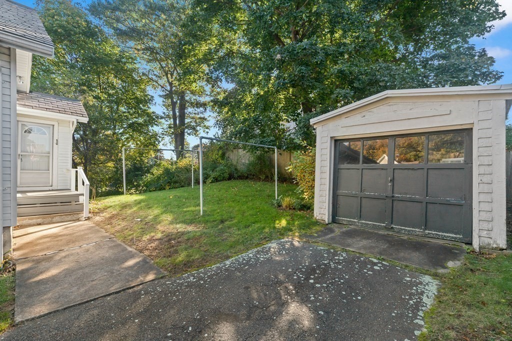 3 Station Road Salem, MA 01970 - Photo 34 of 40 a backyard of a house with lots of green space