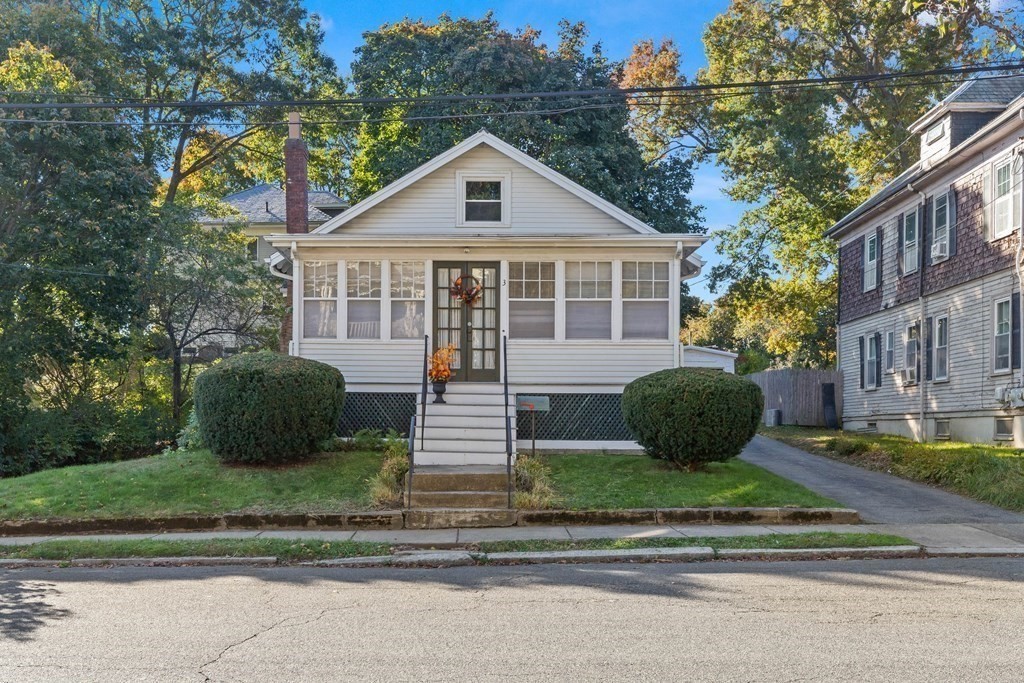 3 Station Road Salem, MA 01970 - Photo 39 of 40 a front view of a house with a yard