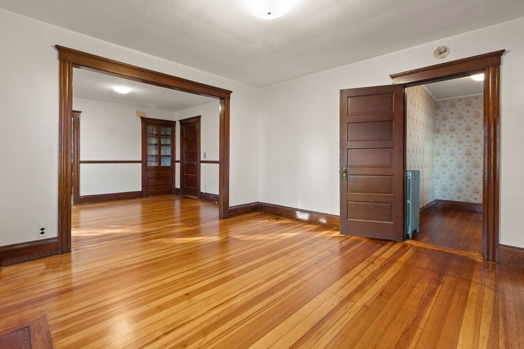 3 Station Road Salem, MA 01970 - Photo 6 of 40 wooden floor in an empty room with a window
