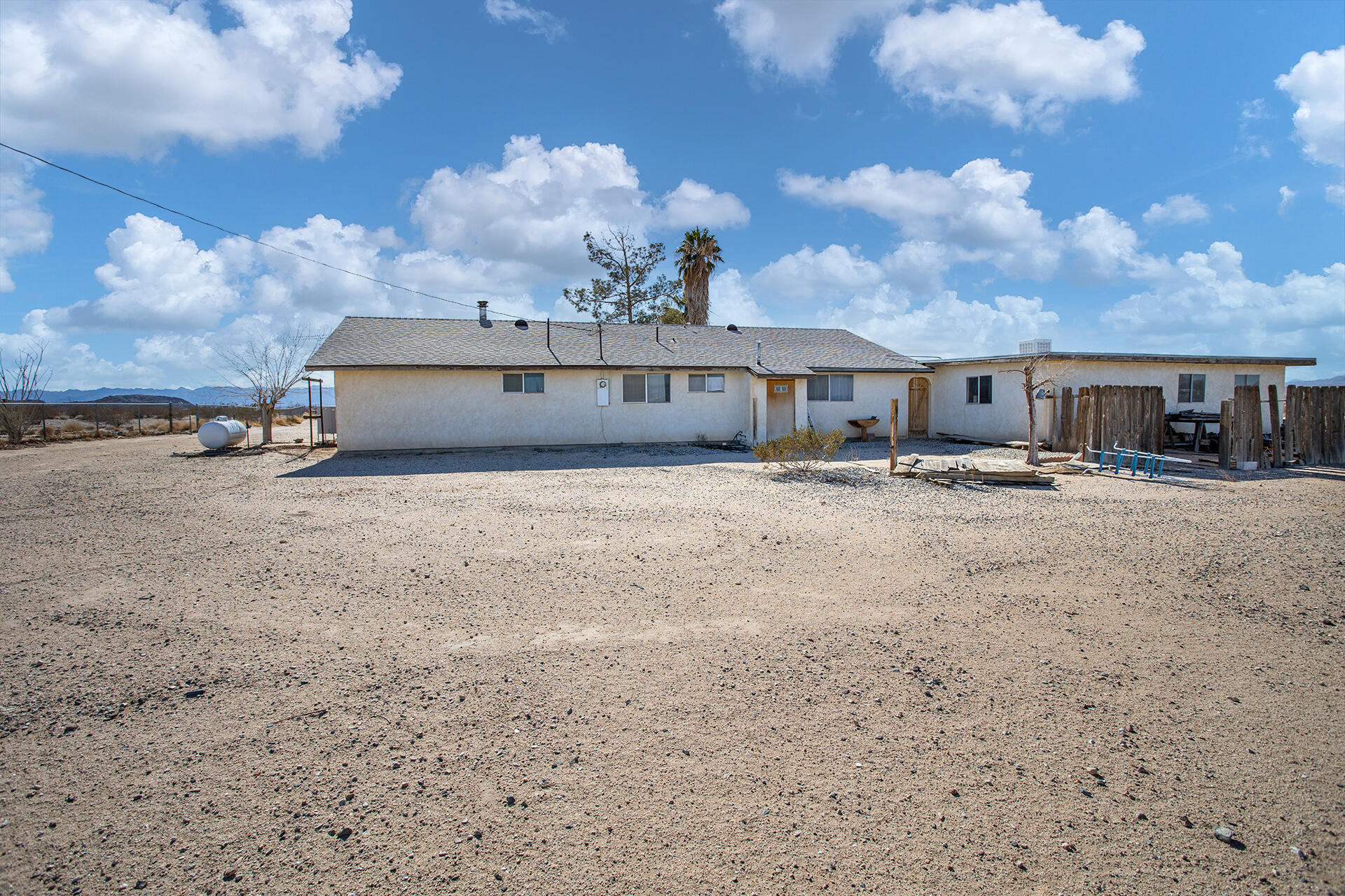 64626 Del Rey Road Joshua Tree, CA 92252 - Photo 4 of 33 a view of a house with a big yard