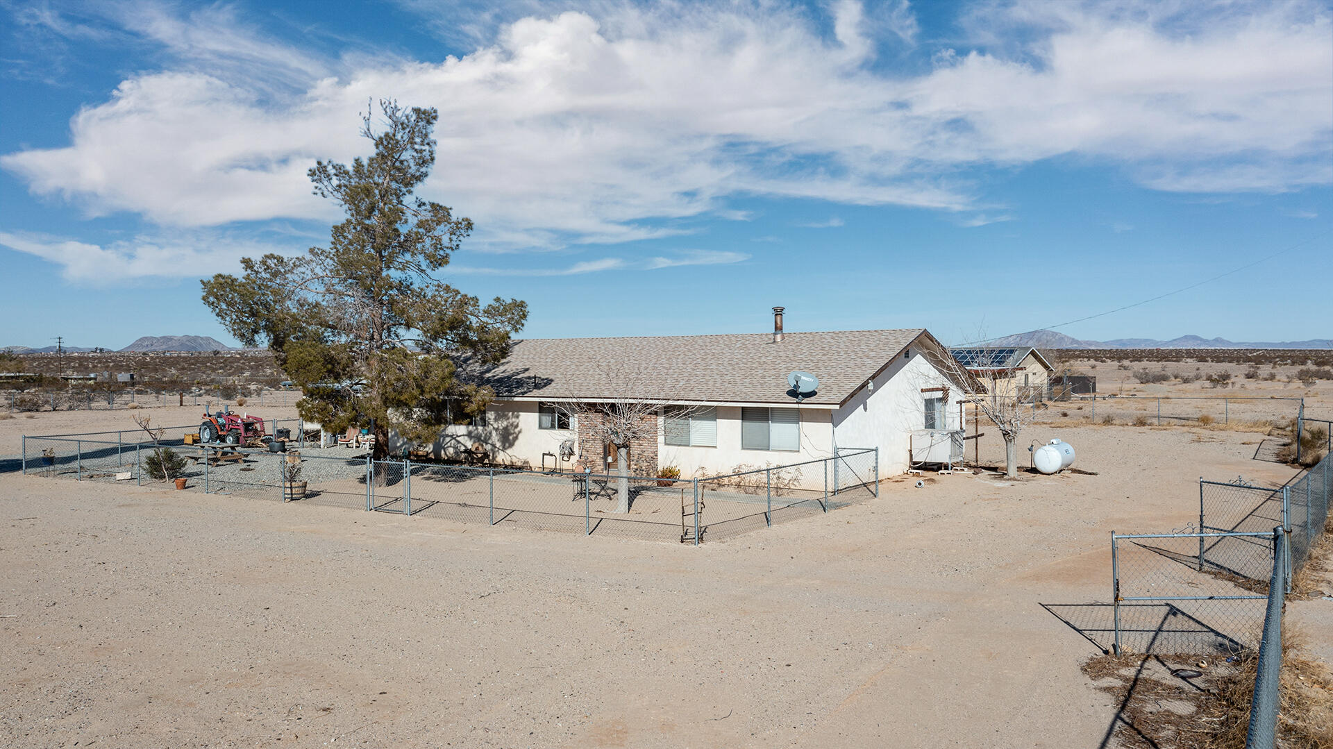 64626 Del Rey Road Joshua Tree, CA 92252 - Photo 5 of 33 an outdoor space with lots of white furniture