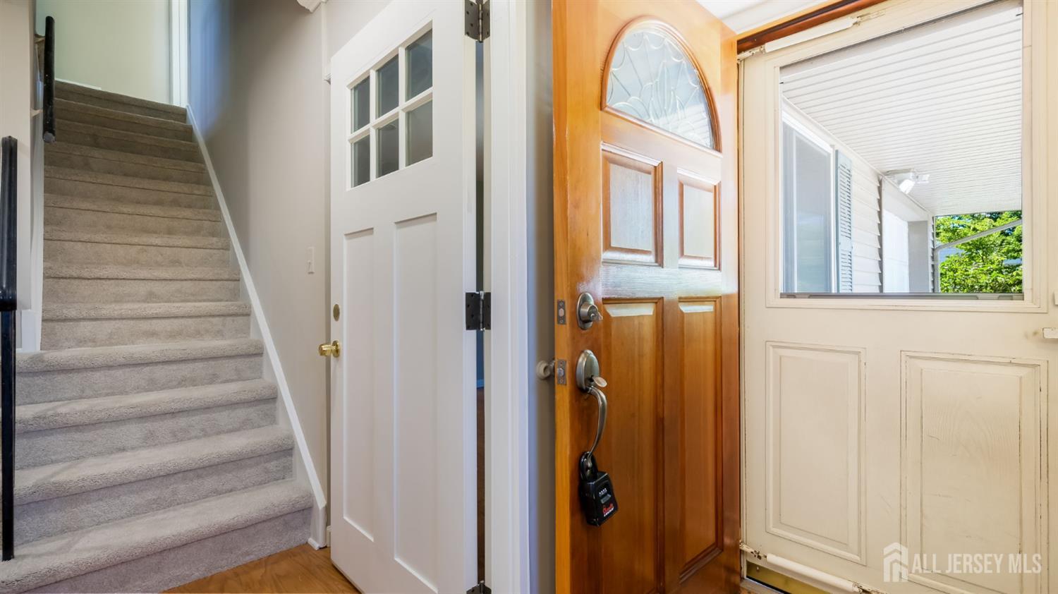 50 Sand Hills Road Kendall Park, NJ 08824 - Photo 3 of 27 a view of an entryway with staircase