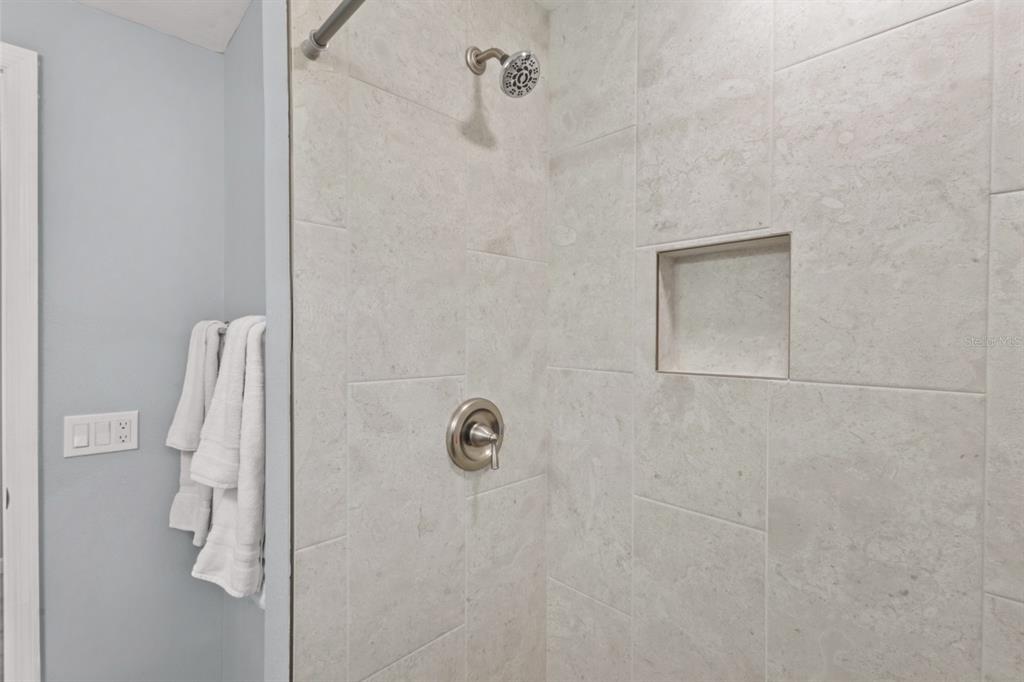 690 Fox Street Longboat Key, FL 34228 - Photo 13 of 41 a bathroom with a shower