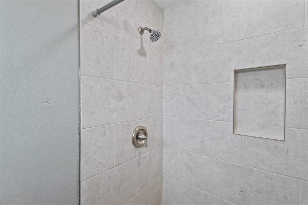 690 Fox Street Longboat Key, FL 34228 - Photo 20 of 41 a bathroom with a shower