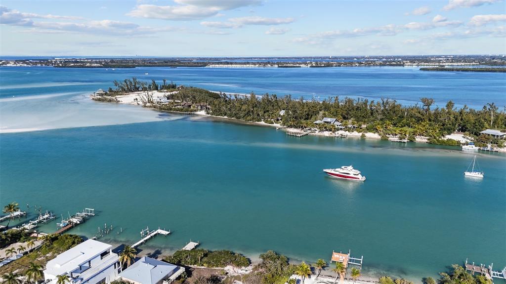 690 Fox Street Longboat Key, FL 34228 - Photo 30 of 41 an aerial view of a house with a lake view