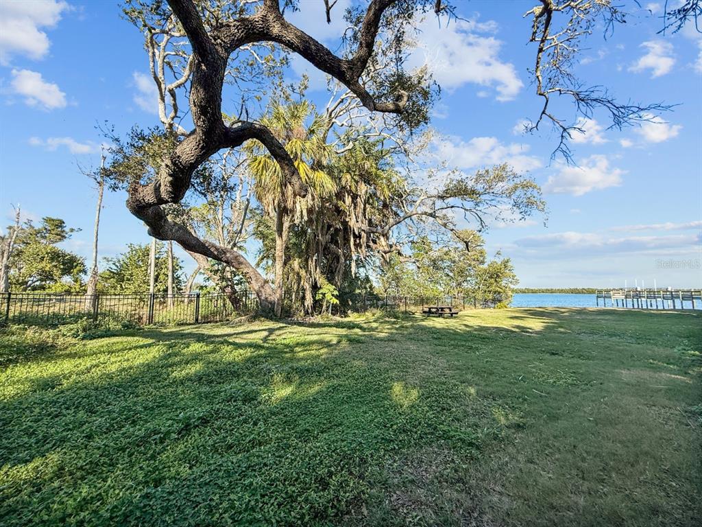 690 Fox Street Longboat Key, FL 34228 - Photo 32 of 41 a view of a big yard