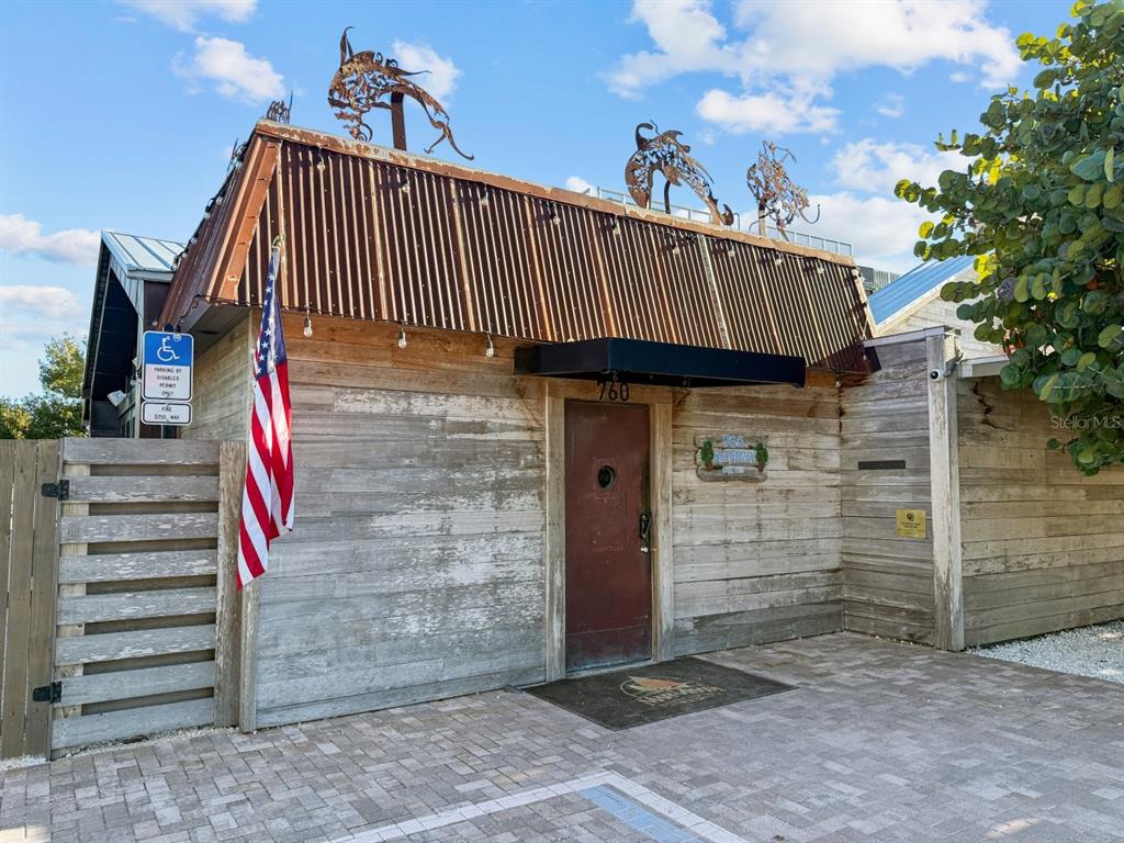 690 Fox Street Longboat Key, FL 34228 - Photo 36 of 41 a view of a house with a stairs
