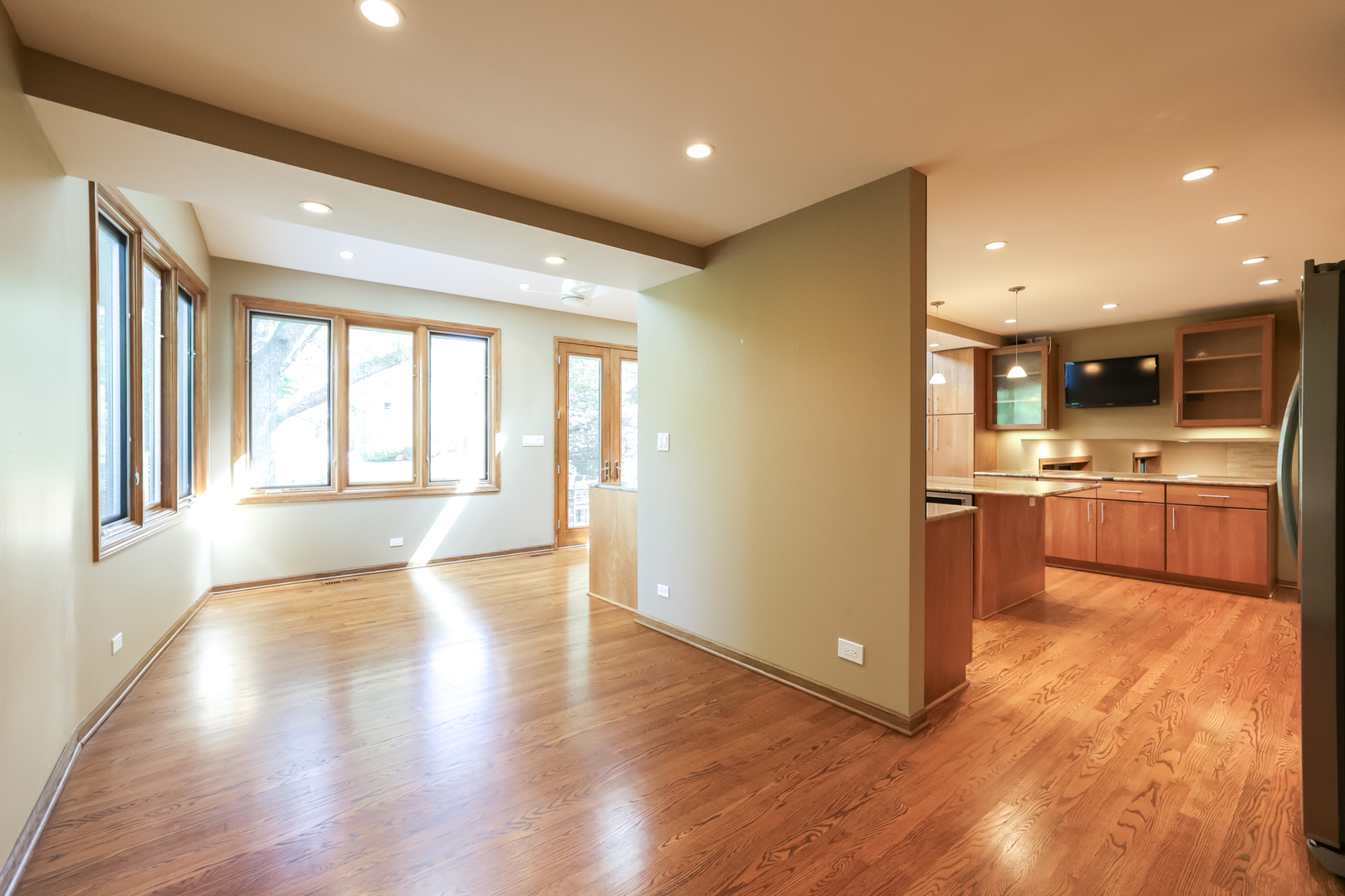 3206 Maple Leaf Drive Glenview, IL 60026 - Photo 22 of 45 a view of kitchen with kitchen island a sink wooden floor and stainless steel appliances