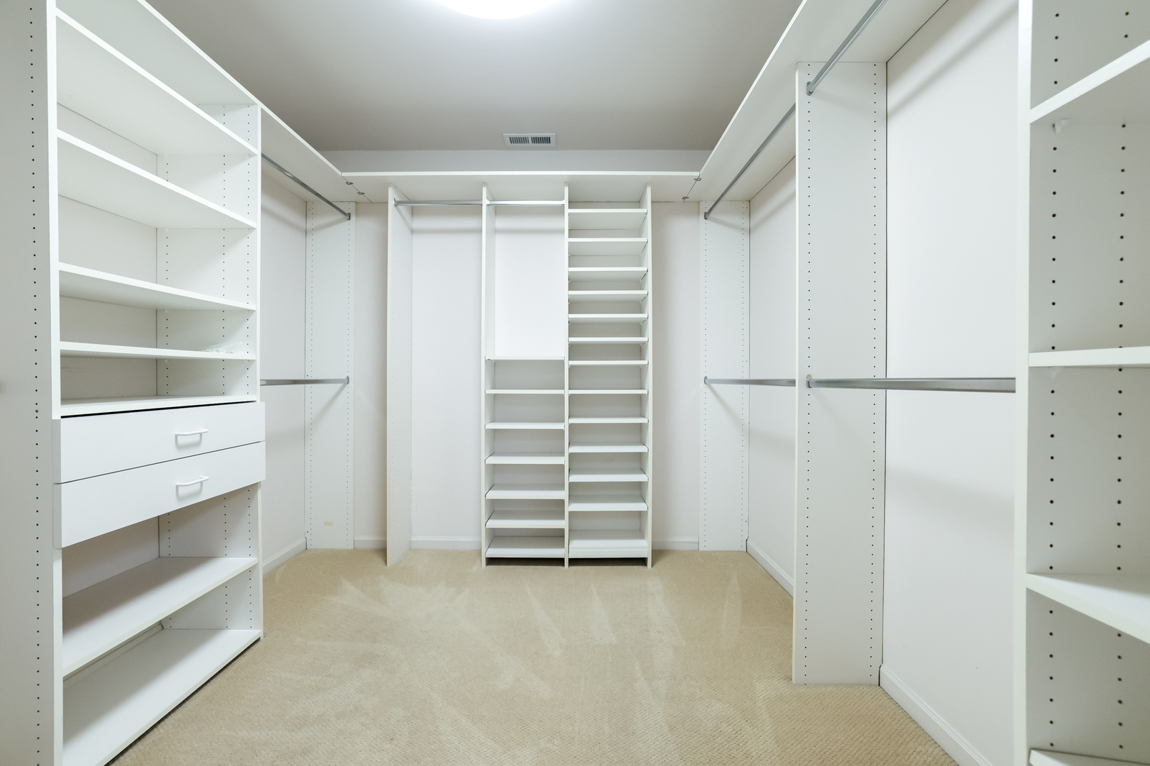 3206 Maple Leaf Drive Glenview, IL 60026 - Photo 34 of 45 a view of walk in closet with empty racks