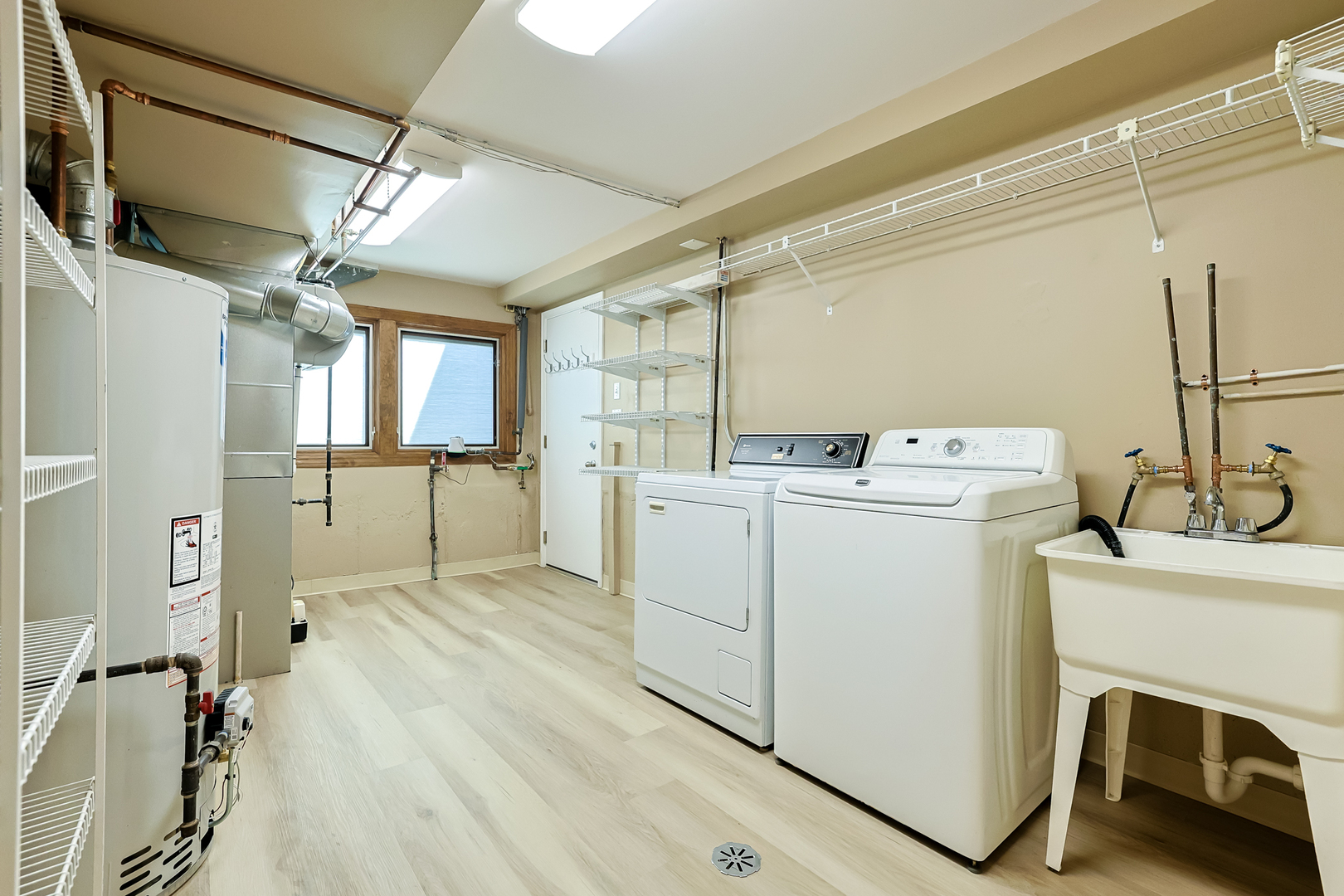 3206 Maple Leaf Drive Glenview, IL 60026 - Photo 41 of 45 a utility room with dryer and washer