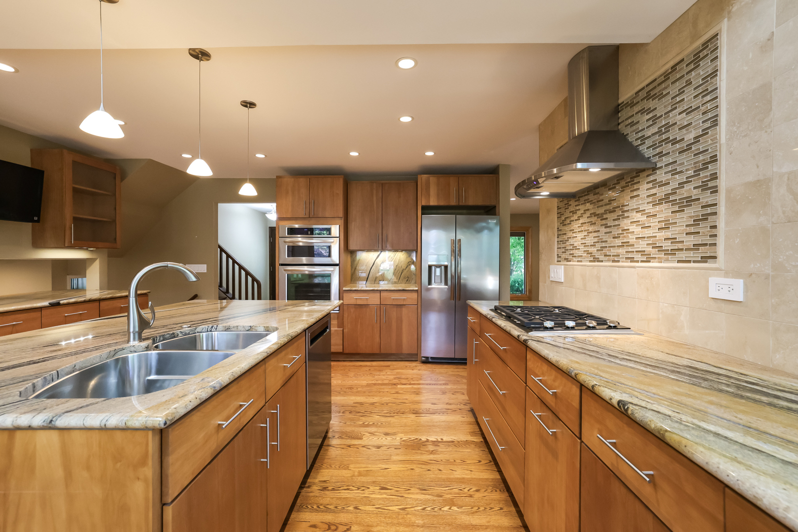 3206 Maple Leaf Drive Glenview, IL 60026 - Photo 7 of 45 a large kitchen with stainless steel appliances granite countertop a sink and a stove