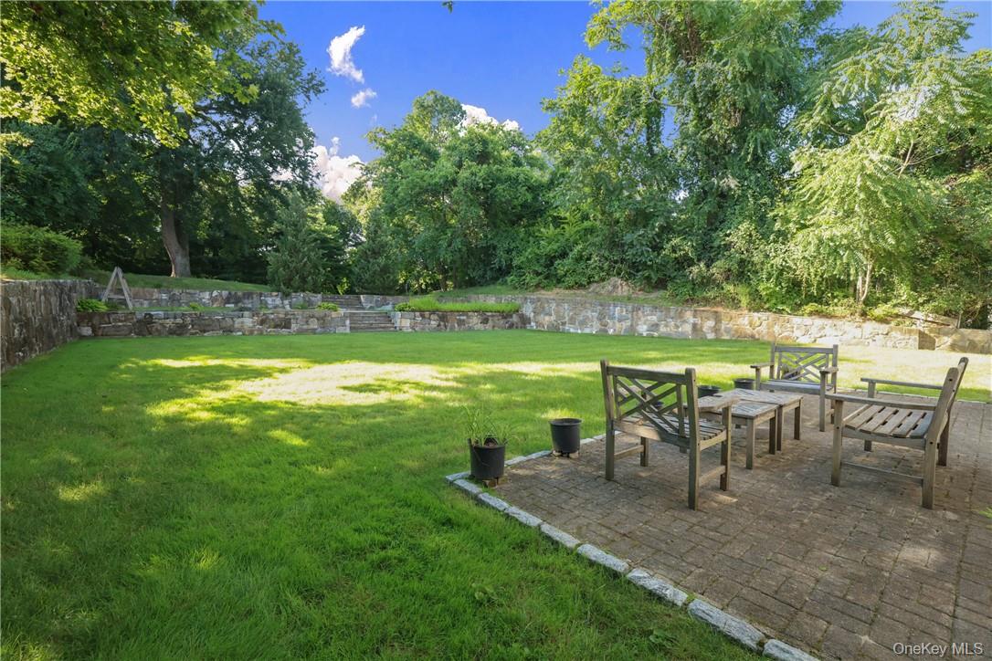 261 Fox Meadow Road Scarsdale, NY 10583 - Photo 13 of 18 View of patio area and backyard