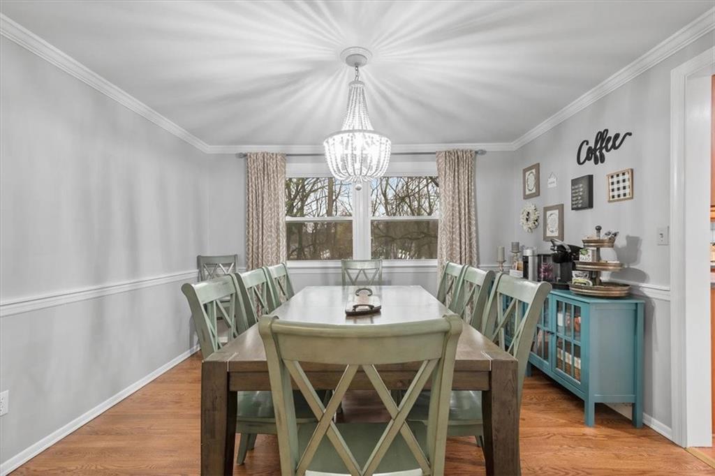 9350 Timber Trail Pittsburgh, PA 15237 - Photo 11 of 38 a view of a dining room with furniture window and wooden floor