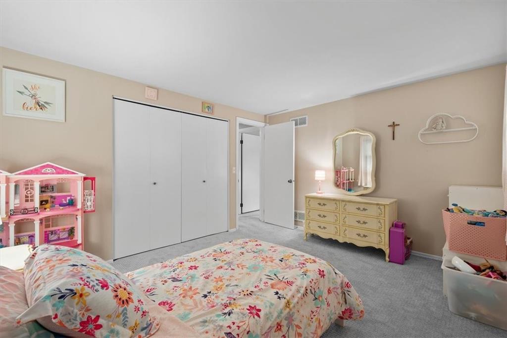 9350 Timber Trail Pittsburgh, PA 15237 - Photo 34 of 38 a bedroom with a bed and a dresser