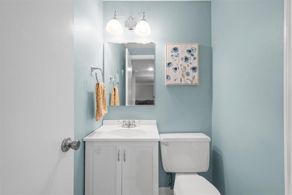 9350 Timber Trail Pittsburgh, PA 15237 - Photo 6 of 38 a bathroom with a toilet sink and mirror