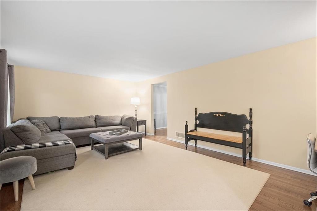 9350 Timber Trail Pittsburgh, PA 15237 - Photo 8 of 38 a living room with furniture and a wooden floor