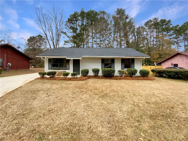 a front view of a building with street view