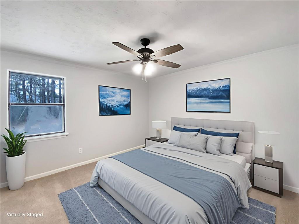 445 Wilson Mill Road Southwest Atlanta, GA 30331 - Photo 14 of 23 a bedroom with a large bed and a window