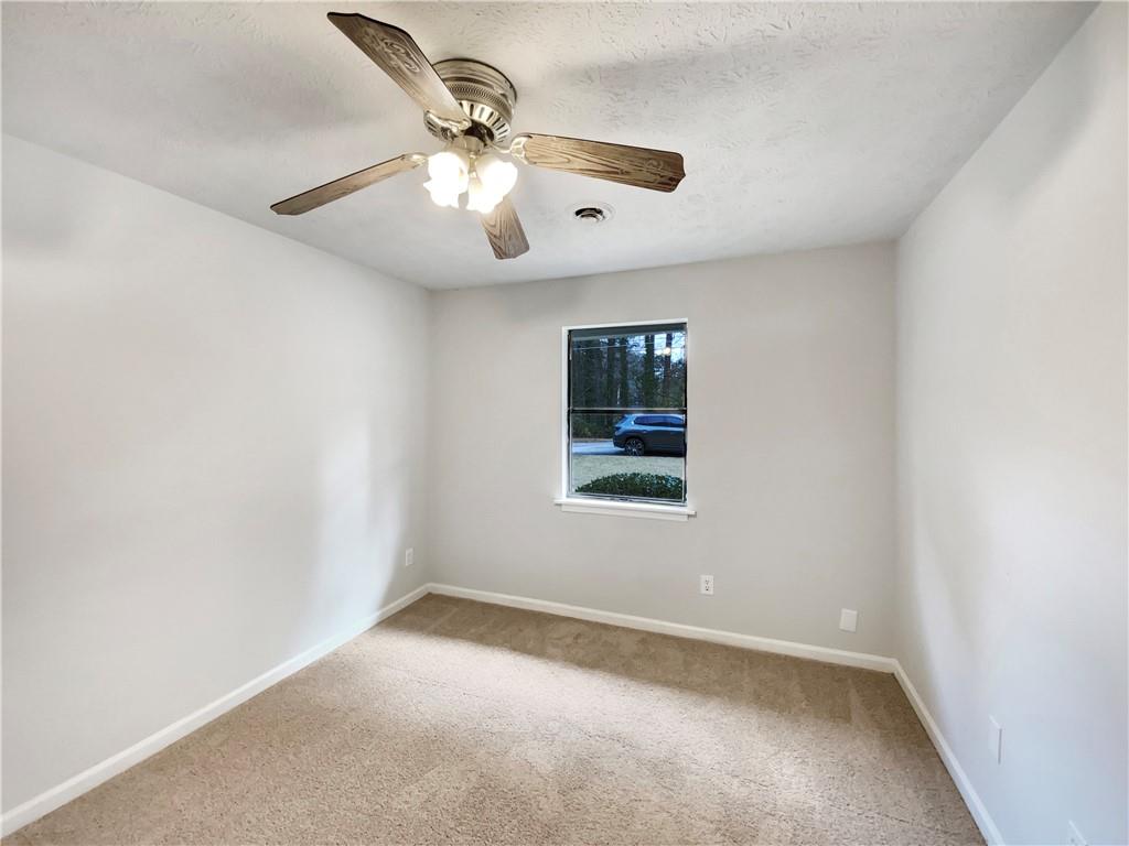 445 Wilson Mill Road Southwest Atlanta, GA 30331 - Photo 18 of 23 an empty room with a window