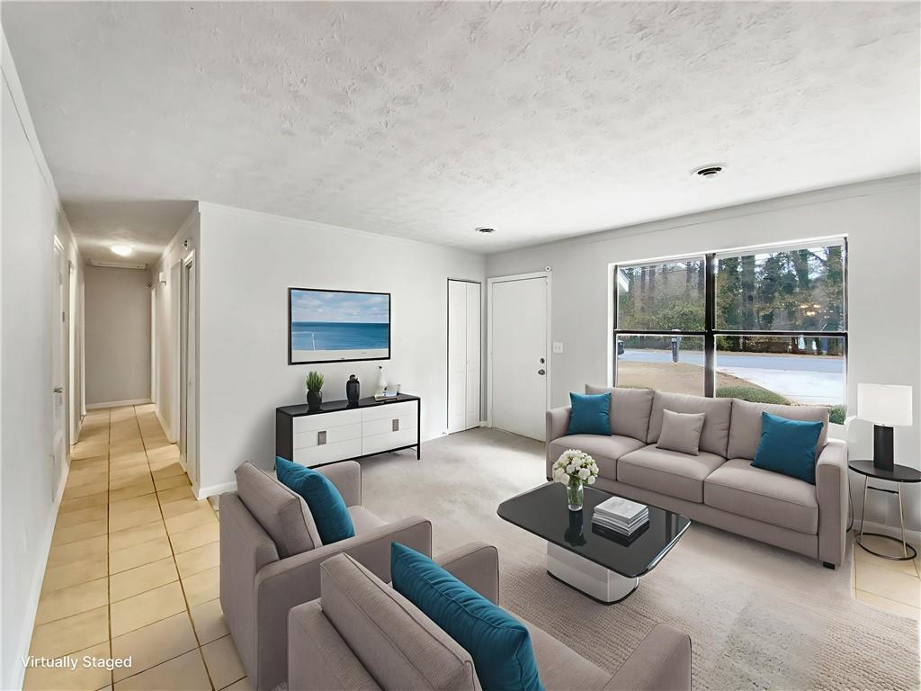 445 Wilson Mill Road Southwest Atlanta, GA 30331 - Photo 3 of 23 a living room with furniture and a couch