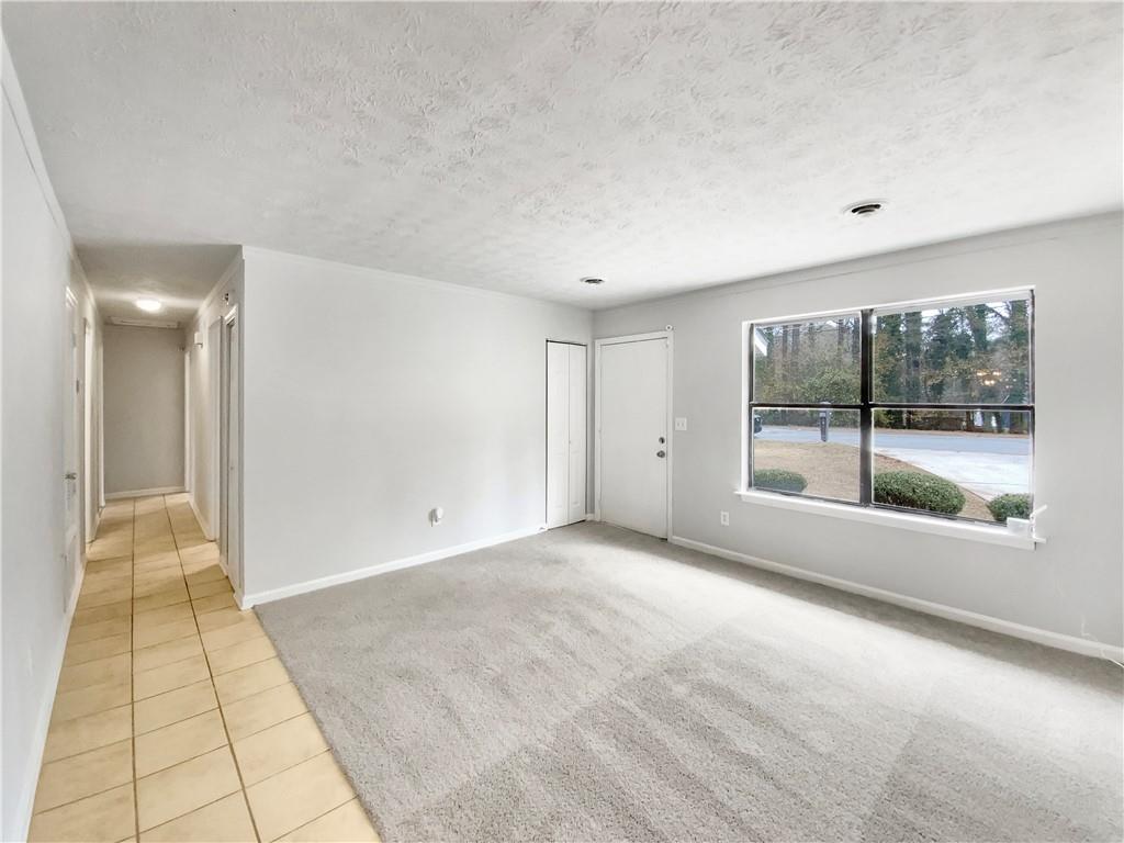 445 Wilson Mill Road Southwest Atlanta, GA 30331 - Photo 4 of 23 a view of empty room with window