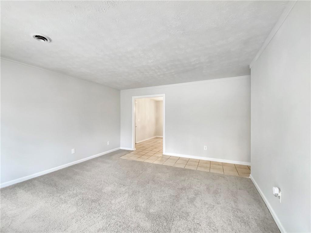 445 Wilson Mill Road Southwest Atlanta, GA 30331 - Photo 6 of 23 a view of an empty room with a window