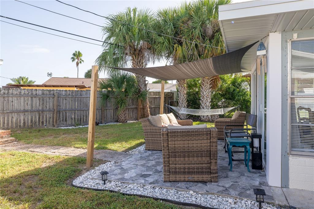 54 Rivershore Drive Ormond Beach, FL 32176 - Photo 23 of 38 a view of a couches in patio of back yard