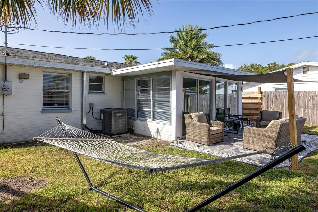 54 Rivershore Drive Ormond Beach, FL 32176 - Photo 26 of 38 a view of a house with backyard and sitting area