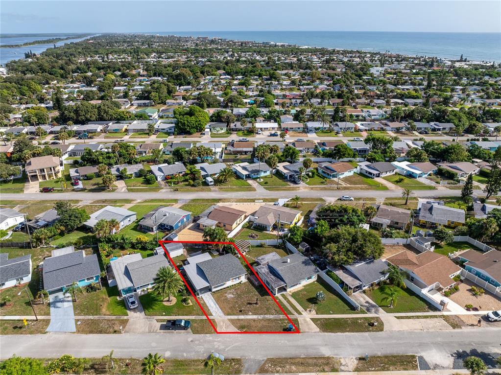 54 Rivershore Drive Ormond Beach, FL 32176 - Photo 35 of 38 an aerial view of residential houses with outdoor space and swimming pool