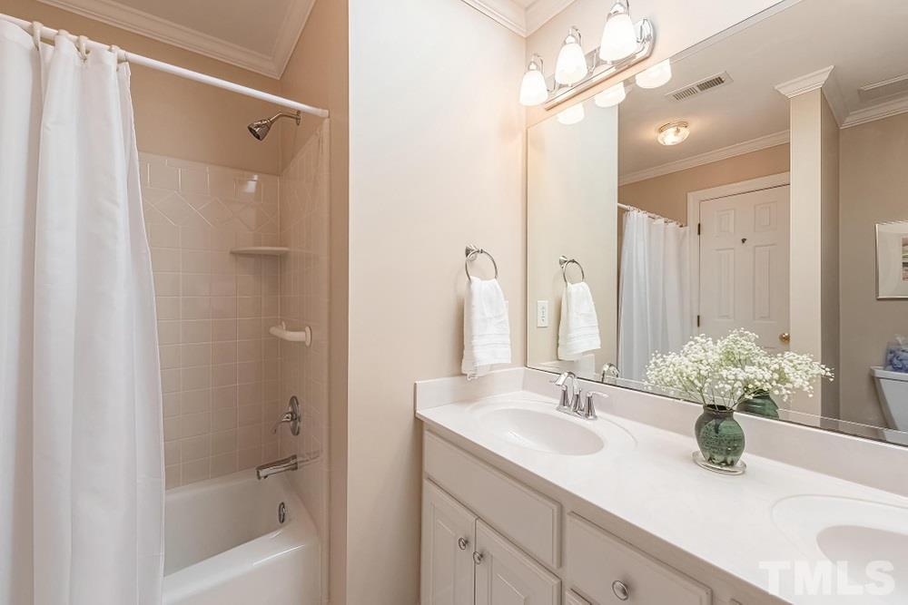 204 Reedham Way Raleigh, NC 27615 - Photo 19 of 30 Full Bath on second level with tub/shower.