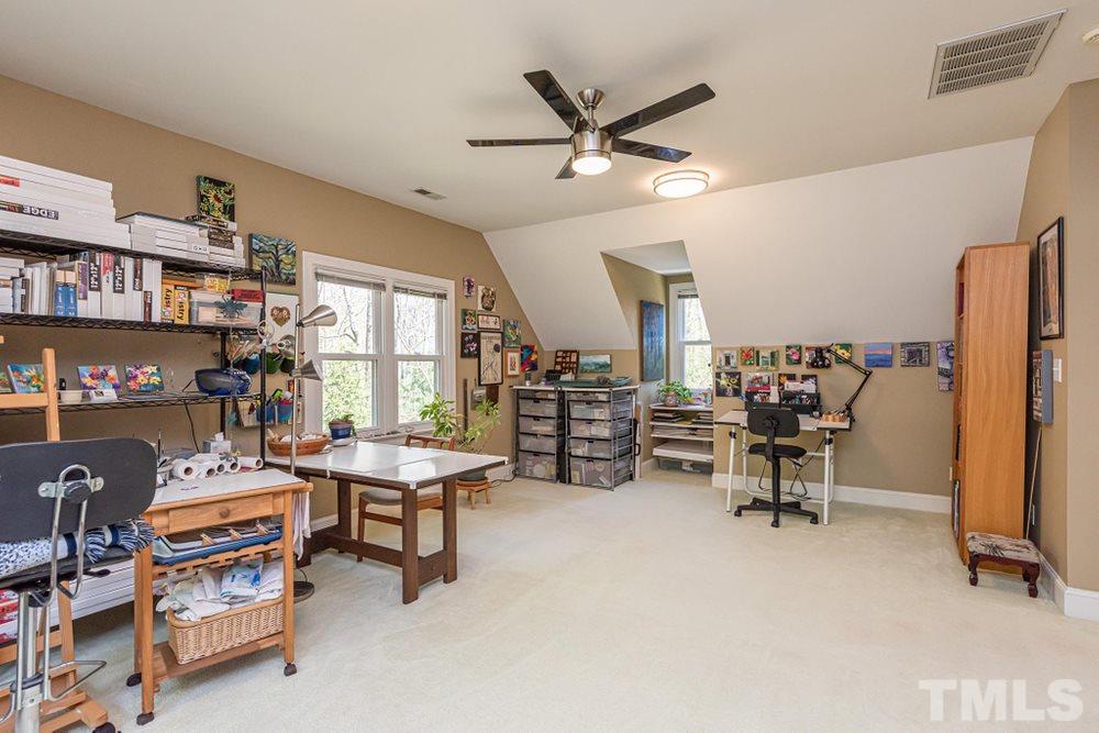 204 Reedham Way Raleigh, NC 27615 - Photo 21 of 30 Lots of natural light from windows, ceiling fan, this space could be used as a Craft/Home Schooling/Fitness/Mancave Room!